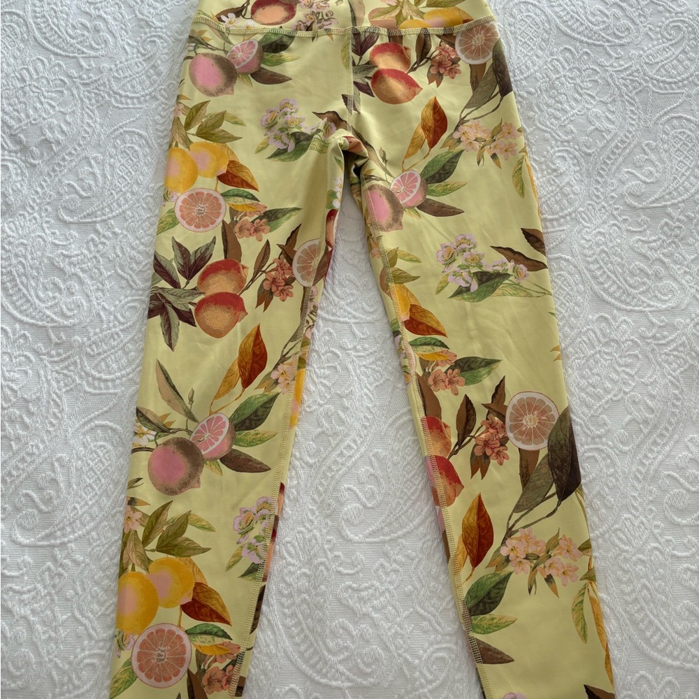Beyond Yoga Yellow and Pink Leggings with Vibrant Design